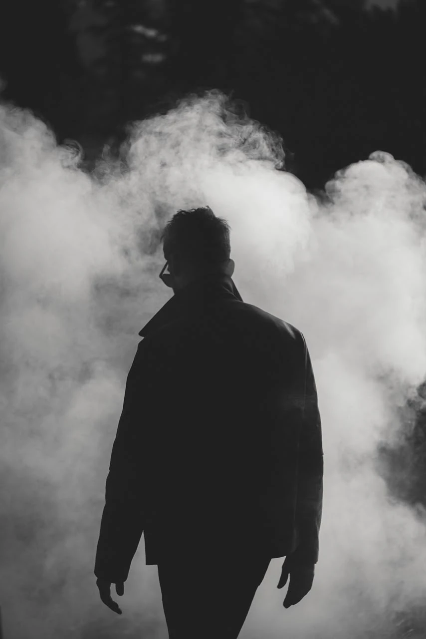 Saaki silhouetted against smoke